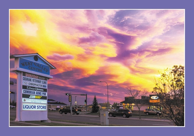 A giant “;eagle”dominated the spectacular sunset over Cochrane last Friday, seen here facing south from the West Valley Centre along Quigley Dr. just west of the Cowboy Trail.