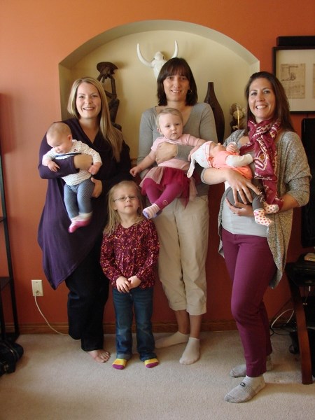 Erin Moyen (from left) holding Murron Agnew (three months old), Morgan Murray (five years old), Lucy Lovelock, holding one-year-old Tess Murray and Laura Wilson, holding