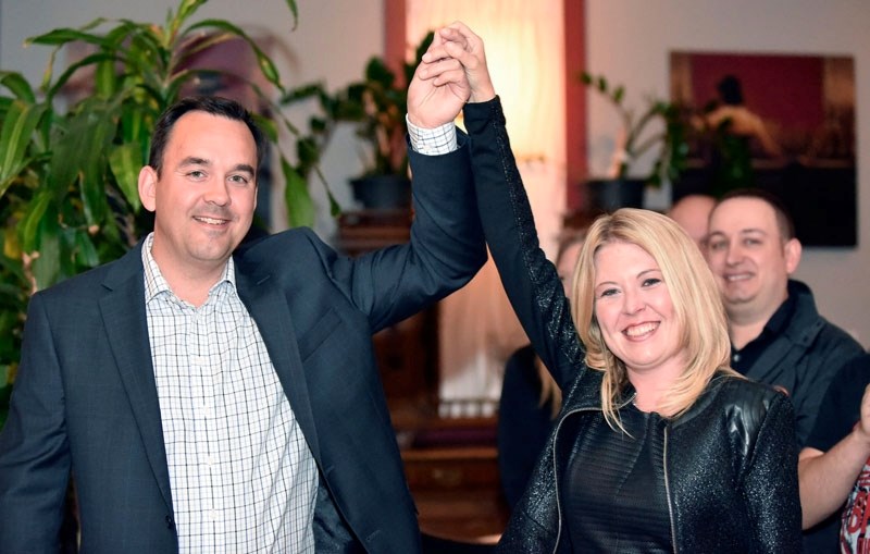 Banff-Airdrie Conservative Member of Parliament Blake Richards celebrates his election win with returning Conservative Calgary-Nose Hill MP Michelle Rempel on Oct. 19 in