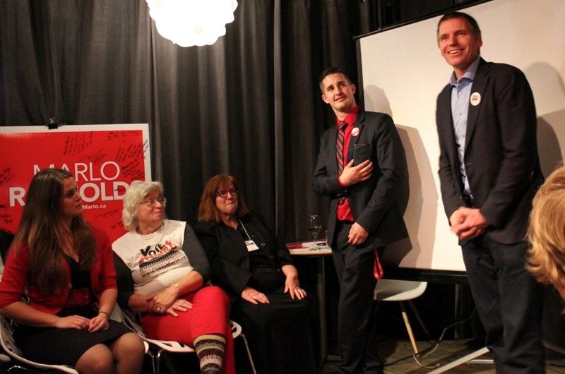 Banff-Airdrie Liberal candidate Marlo Raynolds (right) addresses supporters in Canmore on Oct. 19 after finishing second in his riding in the federal election