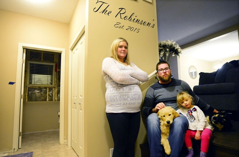Rayelle and Toby Robinson, and their family, have been mourning the loss of two family dogs which perished Nov. 3 after scalding hot water burst through a pipe in the