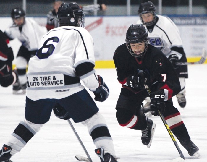 Timberwolves forward Caleb Willms (right) prepares to shoot in Bow Valley&#8217;s 9-5 loss to Central AB Selects on Oct. 31 at Cochrane Arena. Willms managed two goals in the 