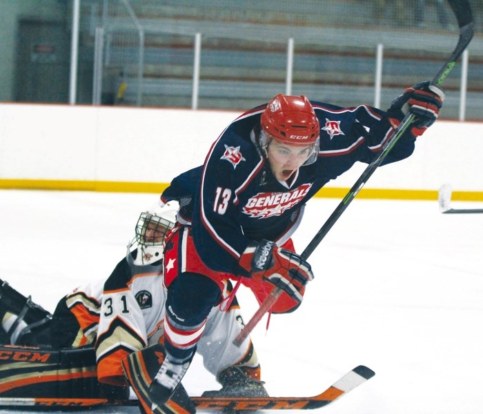 Cochrane Generals forward Corey Goeson scores during his team&#8217;s 12-9 victory over Coaldale Copperheads on Nov. 7 in Cochrane. The game was the highest-scoring game in