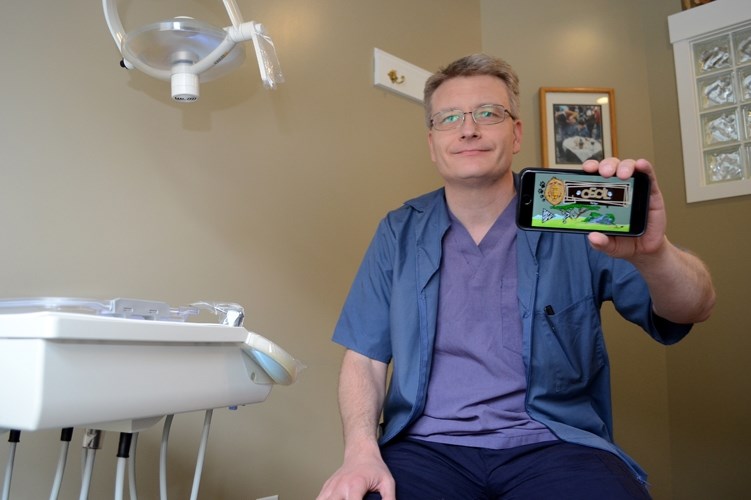 Cochrane dentist Dwayne Hinz has created an application (app) for a game based on Cecil the Lion, the wild lion shot in Zimbabwe last summer by a U.S. dentist.
