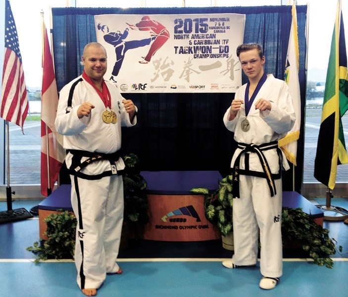 Trinity Taekwon-Do members Cameron McDonald (left) and Christian Blazina (right) show off their medals at the International Taekwon-Do Federation&#8217;s (ITF) North American 