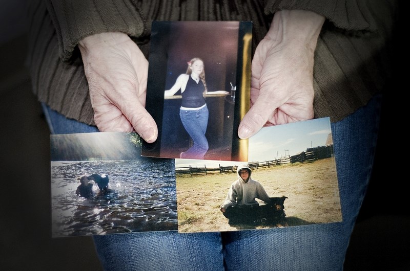 Dubhe Coates clutches photographs of her daughter, Sarah. Reported missing in December 2012 by her mother, Sarah&#8217;s abandoned van was found Oct. 22, 2013, on Stoney