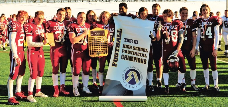 Cochrane Cobras celebrate their Nov. 28 provincial Tier 3 high school football championship over Holy Rosary in Edmonton. Cobras capped an undefeated season with a 55-0 score 
