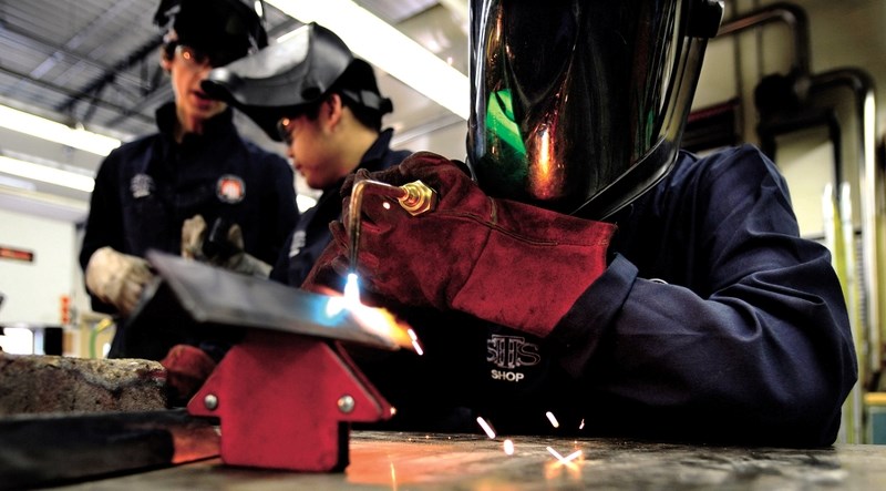 Students at St. Timothy High School work on their trades skills in the school&#8217;s Fabrication Studies class. Approximately 300 junior and senior high school students take 