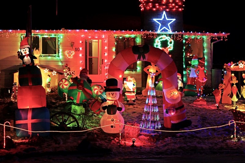 Cindy and Chris Faupel&#8217;s front yard sparkles in the cul-de-sac light up display on Glenpatrick Court on Dec. 7. Four neighbours on the Cochrane cul-de-sac street have