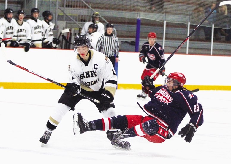 Cochrane Generals defenceman Brett Hamer (23) loses his footing during his team&#8217;s 7-3 victory over Banff Academy Bears on Dec. 6 at Spray Lake Sawmills Family Sports