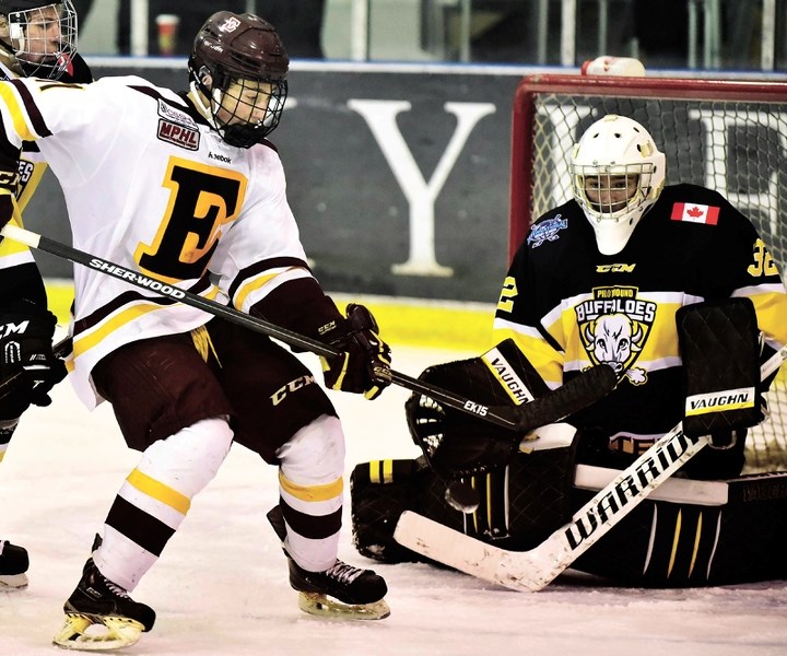 Edge forward Nicholas Pugliese tips the puck on net on Dec. 11 against the Pilot Mound Buffaloes. Edge won the game 6-0 during the fifth annual World Sports School Challenge.