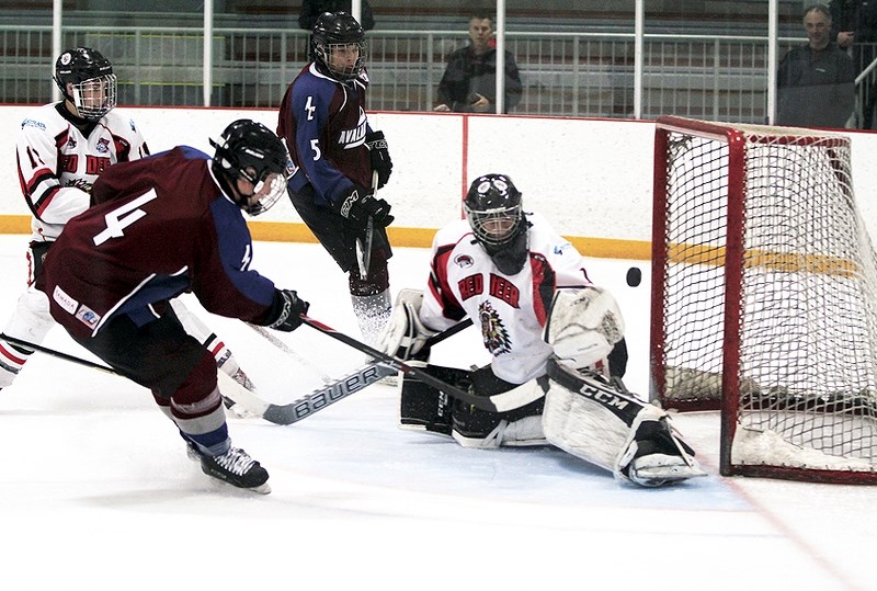 Avalanche forward Eric Van Tetering (4) scores in his team&#8217;s 6-2 victory over Red Deer Strata Energy Chiefs on Dec. 20 at Spray Lake Sawmills Family Sports Centre. The