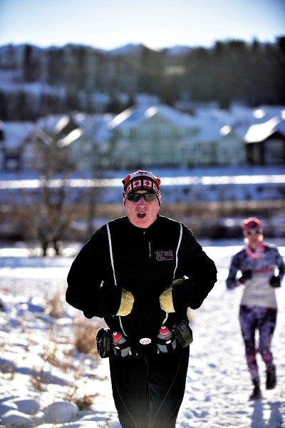 Cochrane&#8217;s Martin Parnell runs his first full marathon Dec. 31 since discovering he had a blood clot in his brain last February. The Marathon Man completed the job,
