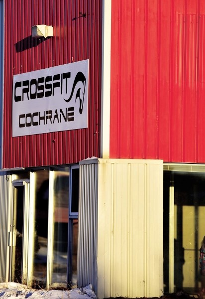 CrossFit Cochrane will soon be open at a new location as the signage is up. The new location is at the former Dodge dealership in downtown Cochrane.