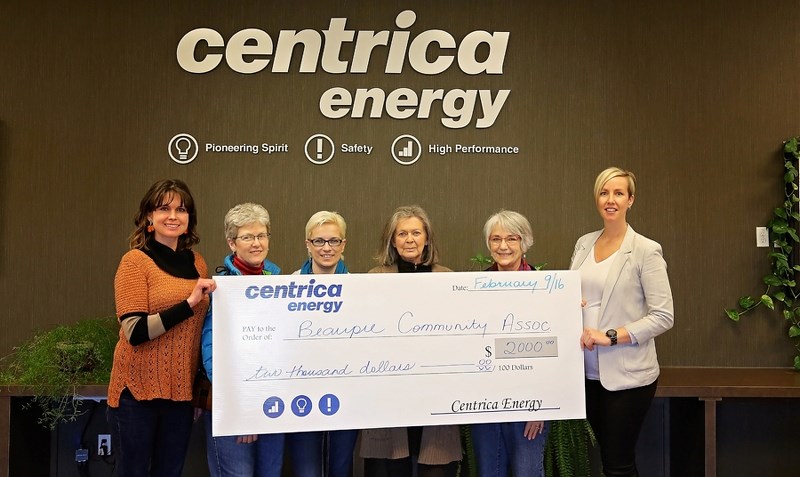 Beaupre Community members (from left) Joleen Molenaar, Linda Thomas, Fiona Verlinde, Joni Gotta, and Hanne Seidel accept a cheque from Centrica Energy&#8217;s Kaili Dale.