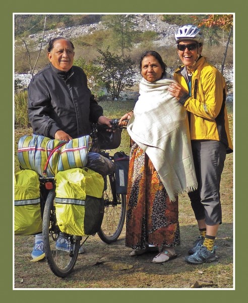 Robyn MacKay (right) poses with new friends while cycling with husband Bruce across northern India to sacred sites and fishing holes.