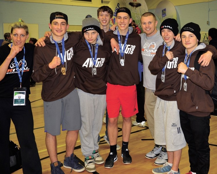 The Zone 2 boxing team (Maxence Roussel, Lewis Chiddle, Ty Klassen, Anthony Walsh, Jude Wilkinson, and Luke Foster) display their medals alongside coach Craig Wilson at the