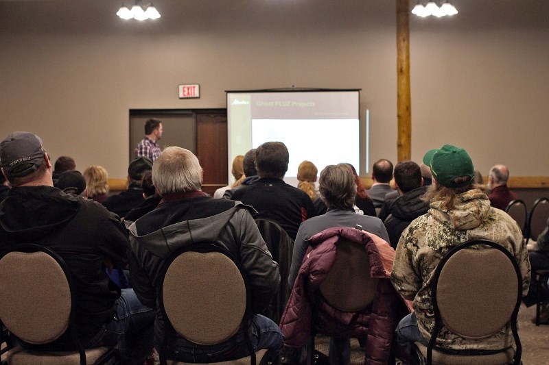 Local residents listen to a presentation from the Backcountry Trail Flood Rehabilitation Program at the Cochrane RancheHouse on Feb. 24. The presentation highlighted the