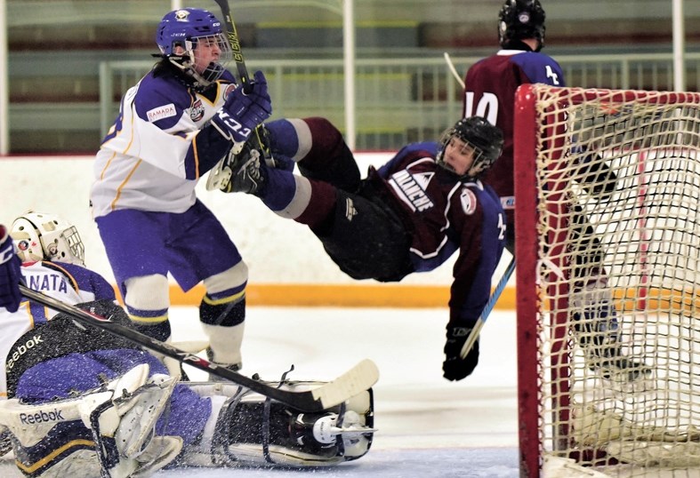 AC Avalanche forward Eric Van Tetering gets in the mix during a goalmouth scramble in the Avs&#8217; 6-3 loss to CRAA Gold on Feb. 27 at Spray Lake Sawmills Family Sports