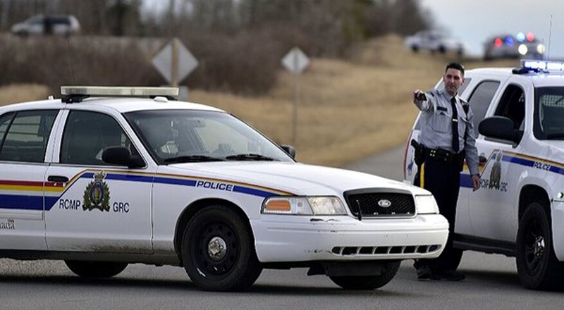 Const. Jennifer Brewer speaks with the media after Cochrane RCMP were called to the Muslim cemetery on March 11 around 3:30 p.m. following multiple 9-1-1 calls reporting a