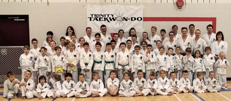 Members of Trinity Taekwon-Do pose after the seventh-annual Trinity-Horizon Inter-Club competition on March 12. The event was the largest put on by the two clubs yet, with