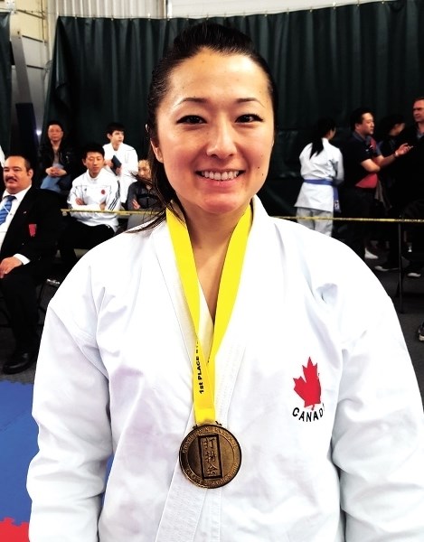 Cochranite and Ippon Karate member Hidemi Uchiage poses with her gold medal (for women&#8217;s kata) at the 43rd Steveston International Championships in Richmond, B.C. on