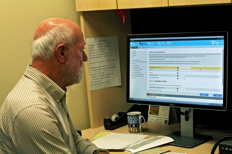 Jerry Koenderink shows the progam he and Janet Watson use for the Community Volunteer Income Tax Program. The program is run through the Canada Revenue Agency, in
