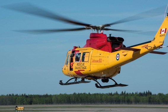 Members of 417 Combat Support Squadron prepare to depart for Fort McMurray from 4 Wing Cold Lake.