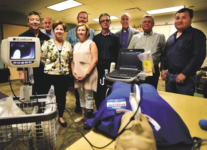 From left, Rotary president, Bob MacLeod; Rotary president elect Paul Kennedy; Urgent Care manager Linda Walters; Kelly and Dianne Kimmett; Glen Gryzko, Rotary chairman for