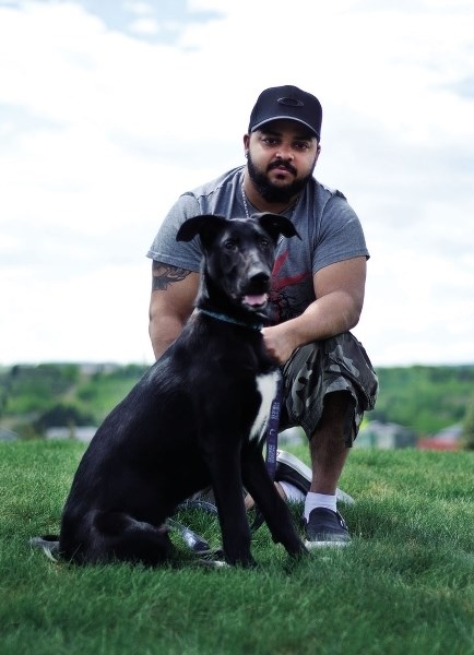 Brendan Banah and his dog, Ace