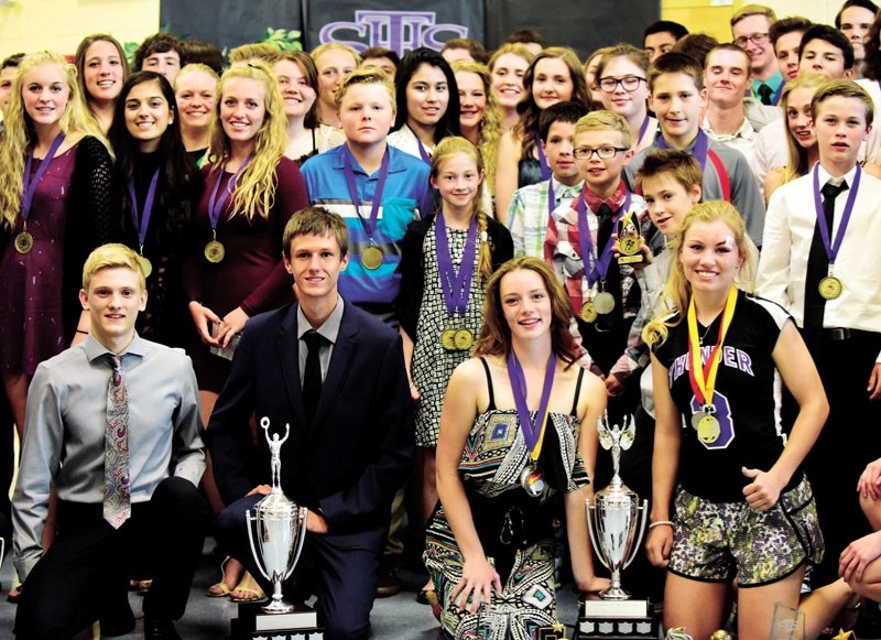 St Timothy High School Thunder athletic award winners pose after the 10th annual Evening with the Thunder on June 1 at the school&#8217;s gymnasium. The event honours St