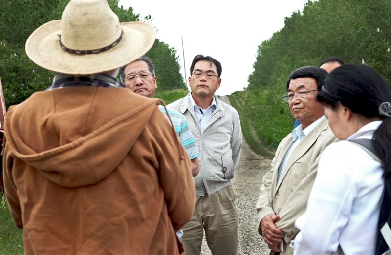 Buckler Farms hosts a tour group from Japan.