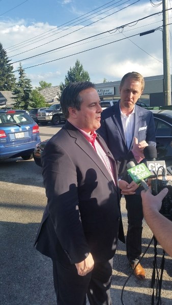 MP Jason Kenney and MP Chris Warkentin speak to reporters before the Alberta Can&#8217;t Wait meeting in Cochrane.