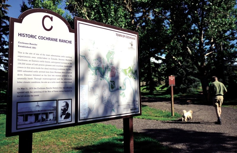 Folks enjoy a walk through the Cochrane Ranche Historic Site on July 20.