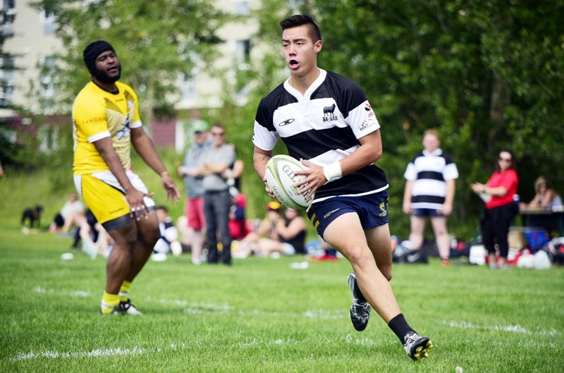Bow Valley Barbarians player Austin Dixon streaks into the end zone for a try during his side&#8217;s Calgary Rugby Union Division Three game against the Banff Bears on July