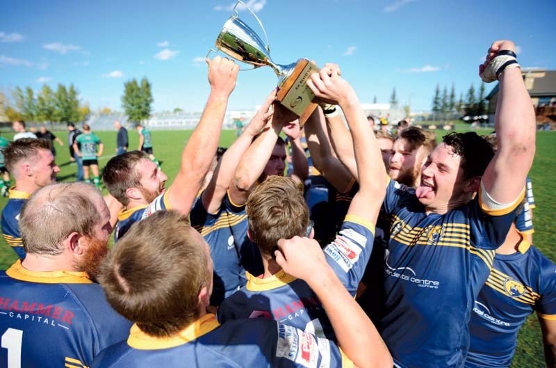 The Grizzlies celebrate their first Division 2 title win.