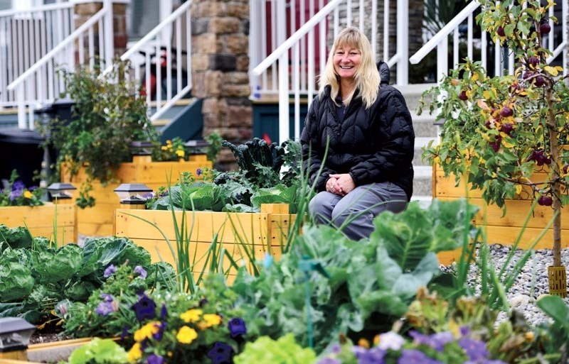 Sheila Klimchuk and her garden full of 17 different vegetables and herbs.