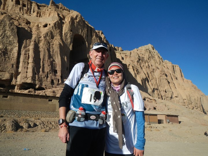 Kubra and Martin Parnell receive medals after completing the marathon in 6:52:00, eight minutes before the seven-hour cut off.