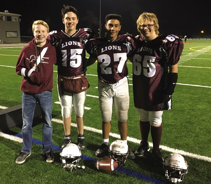 Xavier Vaillancourt (second from left) will quarterback the CFBA selects team in December.