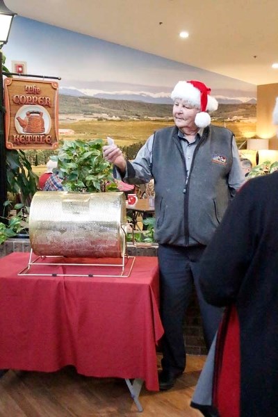 Jack Tennant draws for the Bethany Family Council&#8217;s 50/50.