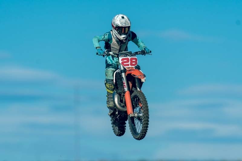 Motocross rider Luke Del Guercio performs a jump on his bike this past fall.
