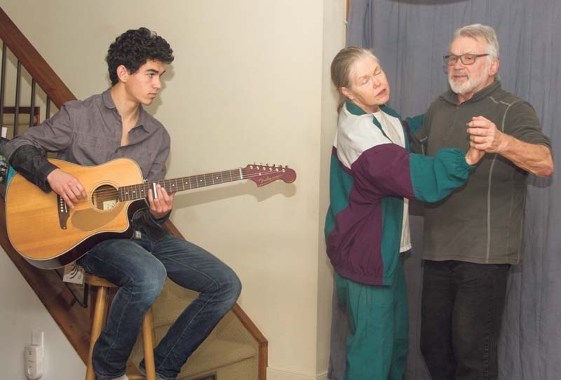Emmett Jerome rehearses with Diane and Les Antoniak at a Bragg Creek home on Jan. 4.