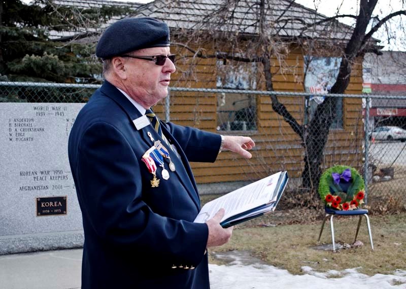 Dave Usherwood, legion first vice-president of the Cochrane Legion, points to the site of the cenotaph expansion.