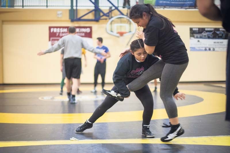 Danika Cook, 15, wrestles for St. Tim&#8217;s.
