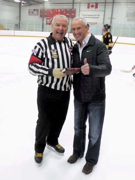 Ron Czuy spent a few minutes chatting about hockey with legendary commentator Ron MacLean at a surprise on-ice visit at Spray Lake Sawmills Family Sports Centre Sunday