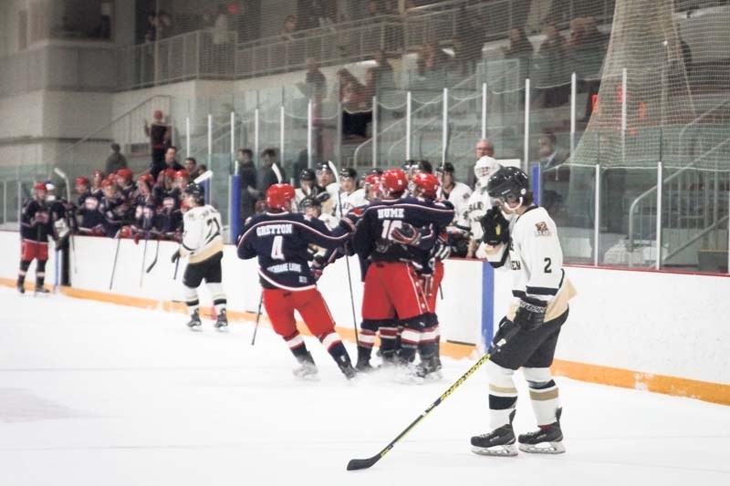 The Cochrane Generals celebrate a goal during the first game of the best-of-seven HJHL semi final series.