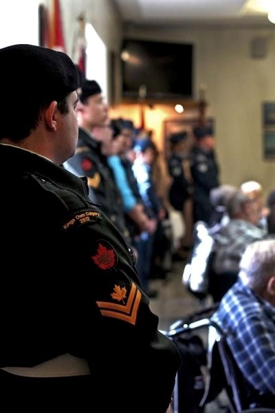 Cochrane Army Cadets stand at attention during the singing of O Canada at the Vimy Ridge event at Cochrane Royal Canadian Legion.