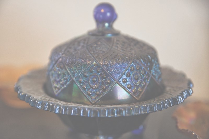 One of the more than 300 pieces of carnival glass collectors got to purchase at a contents sale in West Valley