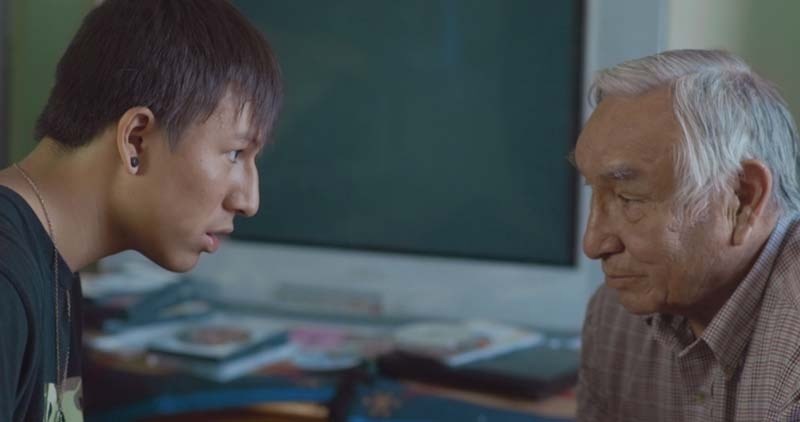A screen capture of a scene from A New Warrior For Hope featuring Gage Beaver and Elder Sykes Powderface.