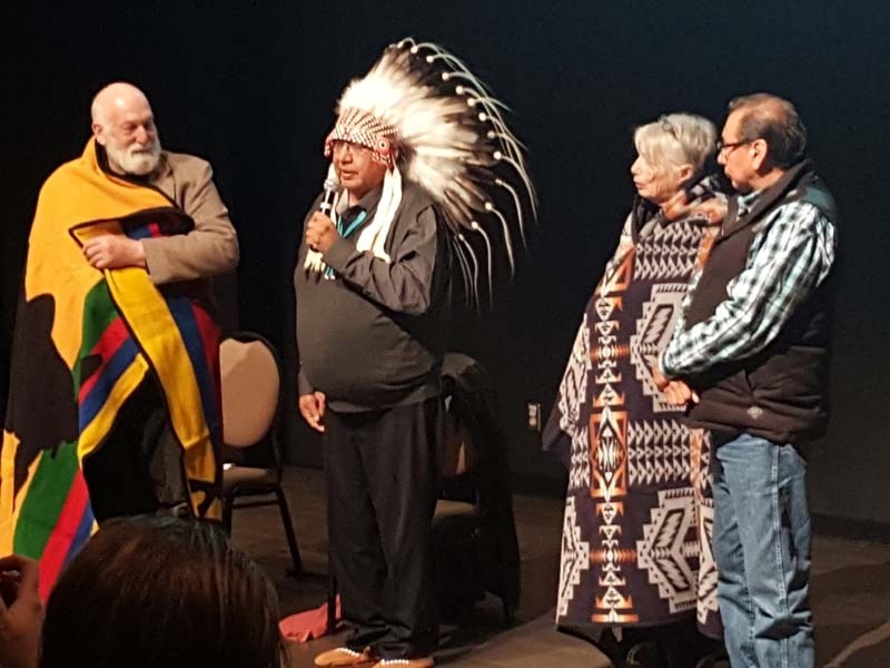 Cochrane Ecological Institute directors Ken Weagle (left) and Clio Smeeton (middle) received honorary Blackfoot names last Saturday from Blackfoot elder Francis First Charger 